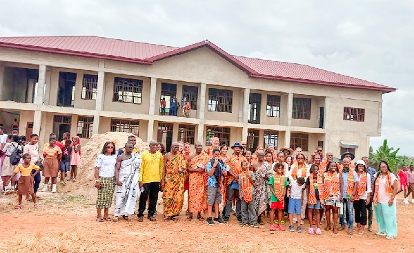 Justin Jones Fosu (arrowed) with members of the Work Meaningful Foundation, traditional leaders and teachers of Akyeremade DA JHS Justin Jones Fosu (arrowed) with members of the Work Meaningful Foundation, traditional leaders and teachers of Akyeremade DA JHS