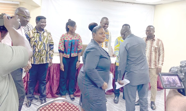 Albert Kwabena Dwumfour (2nd from right), President of GJA, congratulating members of the awards committee Albert Kwabena Dwumfour (2nd from right), President of GJA, congratulating members of the awards committee