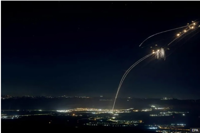 Dozens of rockets fired by Hezbollah were intercepted over northern Israel by the Israel Iron Dome air defence system Dozens of rockets fired by Hezbollah were intercepted over northern Israel by the Iron Dome air defence system