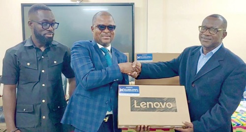 Joseph Kpemka (left), Deputy MD, BOST, presenting the computers to Prof. Anthony Simon, the Pro VC of UMaT Joseph Kpemka (left), Deputy MD, BOST, presenting the computers to Prof. Anthony Simon, the Pro VC of UMaT