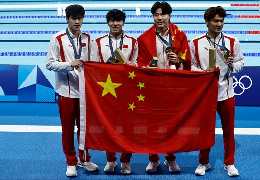Gold medallists Jiayu Xu of China, Haiyang Qin of China, Jiajun Sun of China and Zhanle Pan of China pose for pictures Gold medallists Jiayu Xu of China, Haiyang Qin of China, Jiajun Sun of China and Zhanle Pan of China pose for pictures