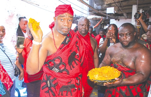 King Tackie Teiko Tsuru (left), Ga Mantse, sprinkling kpokpoi in Accra yesterday King Tackie Teiko Tsuru (left), Ga Mantse, sprinkling kpokpoi in Accra yesterday