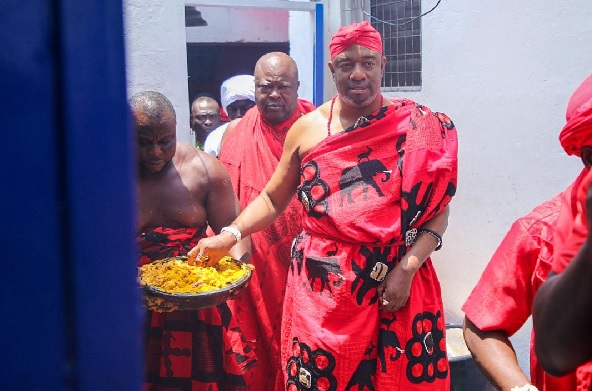 King Nii Tackie Teiko Tsuru II, Ga Mantse, sprinkling kpokpoi at Ga Mashie. Picture: CALEB VANDERPUYE King Nii Tackie Teiko Tsuru II, Ga Mantse, sprinkling kpokpoi at Ga Mashie. Picture: CALEB VANDERPUYE