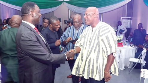 Dr Yaw Osei Adutwum (left), Minister of Education, interacting with Ato Afful, Managing Director, Graphic Communications Group Ltd, after the Think Energy SDG Awards ceremony in Akosombo. Picture: ELVIS NII NOI DOWUONA