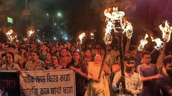 The protesters held flaming torches and candles during the marches