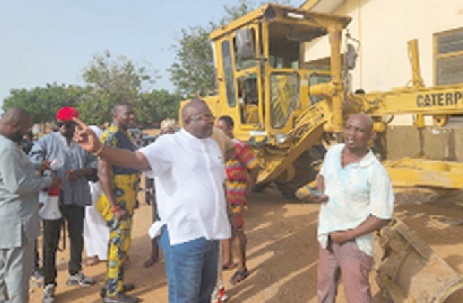 Mawutor Agbavitor (hand stretched), Volta Regional Chairman of the NDC, speaking at one of the sites