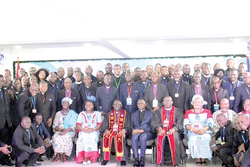 Rt Rev. Prosper Samuel Dzomeku (seated 3rd from left), Moderator, Global Evangelical Church, and Apostle Eric Nyamekye (seated 4th from left), with leaders of the Global Evangelical Church and some guests Rt Rev. Prosper Samuel Dzomeku (seated 3rd from left), Moderator, Global Evangelical Church, and Apostle Eric Nyamekye (seated 4th from left), with leaders of the Global Evangelical Church and some guests