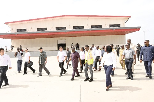 Kwaku Ofori Asiamah (3rd from right) being conducted round the James Town Fishing Harbour