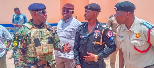 Colonel Owusu Apaah (left), Bawku Joint Security Taskforce Commander, in a discussion with ACP Raymond Adofeim (2nd from right), Upper East Regional Police Commander, and other service commanders during the launch Colonel Owusu Apaah (left), Bawku Joint Security Taskforce Commander, in a discussion with ACP Raymond Adofeim (2nd from right), Upper East Regional Police Commander, and other service commanders during the launch