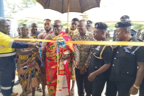 Nana Yeboah Asuama (3rd from left), Apesemakahene of the Kenyasi No.1 Traditional Area, being assisted by Professor Yaw Ofosu Kusi (3rd from right), Board of Trustees Chairman of NADeF, Emmanuel Ato Aubynn (left), Social Responsibility Manager at the Newmont Ahafo South Mine, and Superintendent of Police Randolph Somiah (2nd from right), Second-in-Command at the Ahafo Regional Police Training School, to cut the tape to inaugurate the projects Nana Yeboah Asuama (3rd from left), Apesemakahene of the Kenyasi No.1 Traditional Area, being assisted by Professor Yaw Ofosu Kusi (3rd from right), Board of Trustees Chairman of NADeF, Emmanuel Ato Aubynn (left), Social Responsibility Manager at the Newmont Ahafo South Mine, and Superintendent of Police Randolph Somiah (2nd from right), Second-in-Command at the Ahafo Regional Police Training School, to cut the tape to inaugurate the projects
