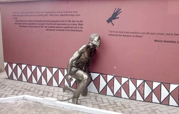 A statue of a slave at the refurbished site