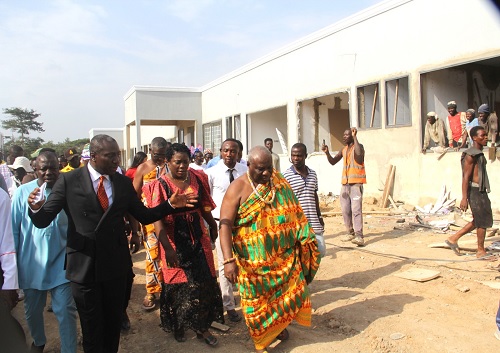 Alexander Afenyo-Markin (left), the MP for Effutu, leading the team during a tour of the hospital. With him are Neenyi Ghartey VII (right in Kente), the Omanhen of the Effutu Traditional Area, and Dr Paulette Brown (2nd from right), the acting Effutu Municipal Director of Health. Pictures: Nana Konadu Agyeman