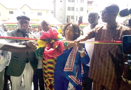 Shirley Ayorkor Botchwey (middle), the Minister of Foreign Affairs and Regional Integration, being assisted by other dignitaries to cut the ribbon to inaugurate the water factory (inset) Shirley Ayorkor Botchwey (middle), the Minister of Foreign Affairs and Regional Integration, being assisted by other dignitaries to cut the ribbon to inaugurate the water factory (inset)
