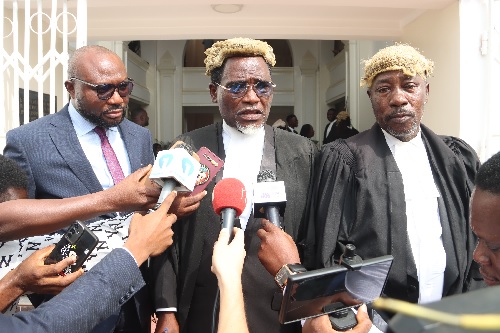 Richard Sky (left), one of the plaintiffs, with his lawyers after the judgment by the court. Picture: ELVIS NII NOI DOWUONA Richard Sky (left), one of the plaintiffs, with his lawyers after the judgment by the court. Picture: ELVIS NII NOI DOWUONA