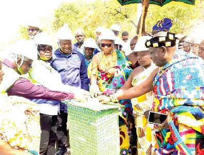 Samuel Kofi Dzamesi (3rd from left), Chief Executive Officer of BPA, being assisted by Justina Owusu-Banahene (2nd from left), Bono Regional Minister; Fred Oware (left), former CEO of BPA, and some chiefs to inaugurate one of the solar power projects. Inset: Part of the 5MWp solar power farm installed on the Bui Dam Samuel Kofi Dzamesi (3rd from left), Chief Executive Officer of BPA, being assisted by Justina Owusu-Banahene (2nd from left), Bono Regional Minister; Fred Oware (left), former CEO of BPA, and some chiefs to inaugurate one of the solar power projects. Inset: Part of the 5MWp solar power farm installed on the Bui Dam