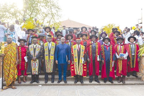 Kwamina Asomaning (arrowed), CEO of Stanbic Bank, with  members of convocation for the congregation after the ceremony Kwamina Asomaning (arrowed), CEO of Stanbic Bank, with  members of convocation for the congregation after the ceremony