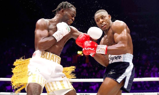 • Buatsi lands a hook to the jaw of Azeez • Buatsi lands a hook to the jaw of Azeez