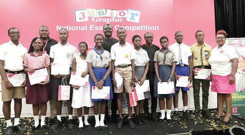 The award winners displaying their certificates