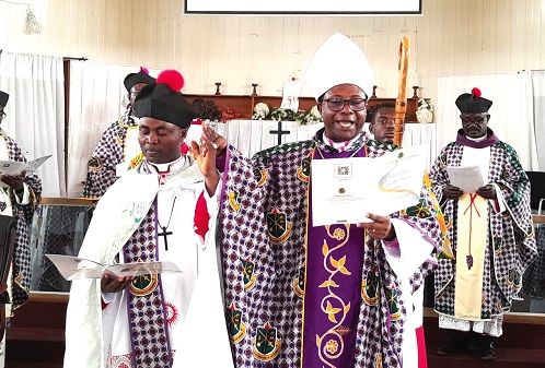 Rt. Rev. Felix Odei Annancy (middle), Bishop of the Koforidua Diocese of the Anglican Church, swearing in Rev. Venerable Nathan Ishmael Duodu Odoi, the new Archdeacon of Kyebi Rt. Rev. Felix Odei Annancy (middle), Bishop of the Koforidua Diocese of the Anglican Church, swearing in Rev. Venerable Nathan Ishmael Duodu Odoi, the new Archdeacon of Kyebi