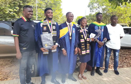 George Frimpong (left), Educational Portfolio Advisor at MTN, together with some of the beneficiaries who graduated George Frimpong (left), Educational Portfolio Advisor at MTN, together with some of the beneficiaries who graduated