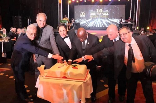 President Akufo-Addo (third from right), Mr Maher Kheir (third from left) and other dignitaries cutting the anniversary cake President Akufo-Addo encourages Lebanese Community Scholarship beneficiaries to maximize opportunities