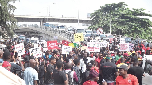 Some of the protesters displaying placards during the march at the Kwame Nkrumah Interchange Pictures: EMMANUEL QUAYE & BEATRICE LARYEA Some of the protesters displaying placards during the march at the Kwame Nkrumah Interchange Pictures: EMMANUEL QUAYE & BEATRICE LARYEA