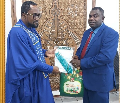 H E Ambassador Prof. Hugh Aryee (left) and Mr Simeon Seoule Davidson after the meeting