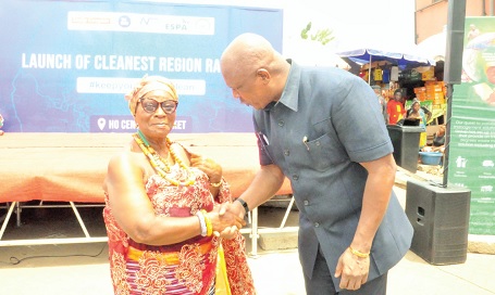 Ato Afful, Managing Director of GCGL, exchanging greetings with Mama Kuma II, a queenmother from Ho-Ahoe Ato Afful, Managing Director of GCGL, exchanging greetings with Mama Kuma II, a queenmother from Ho-Ahoe