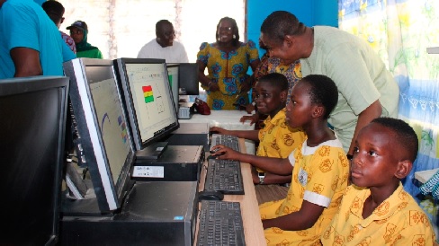 Mohammed Adamu Ramadan (standing right), MP for Adentan Constituency, with some pupils of the Holy Rosary Roman Catholic Basic School who were making use of the computers in the new laboratory Mohammed Adamu Ramadan (standing right), MP for Adentan Constituency, with some pupils of the Holy Rosary Roman Catholic Basic School who were making use of the computers in the new laboratory
