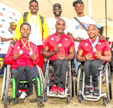 Seated from left: Emmanuel Kwaku Gyasi, Raphael Botsyo Nkegbe and Maclean Atsu Dzidzienyo displaying their medals Seated from left: Emmanuel Kwaku Gyasi, Raphael Botsyo Nkegbe and Maclean Atsu Dzidzienyo displaying their medals