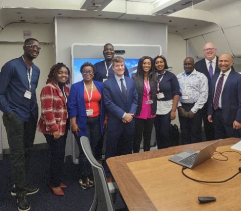 Rob LeBel, MD of International and Speciality Salrs of Delta Air Lines (4th from left), and other staff together with the journalists after the presentation.