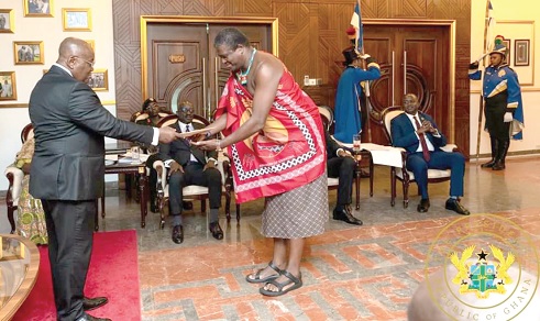 President Akufo-Addo (left) receiving credentials  from Mahlaba Almon Mamba of the Kingdom of Eswatini