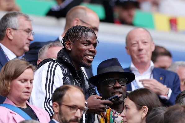 Paul Pogba (with dreadlocks) was invited to France's game against Belgium by the French FA Paul Pogba (with dreadlocks) was invited to France's game against Belgium by the French FA