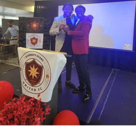 Theophilus Nii Ankamah Densu (left) with his medal Theophilus Nii Ankamah Densu (left) with his medal