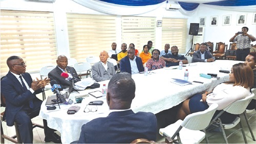 Dr John Kwakye (left), Director of Research, IEA, explaining some issues to stakeholders at the forum Dr John Kwakye (left), Director of Research, IEA, explaining some issues to stakeholders at the forum