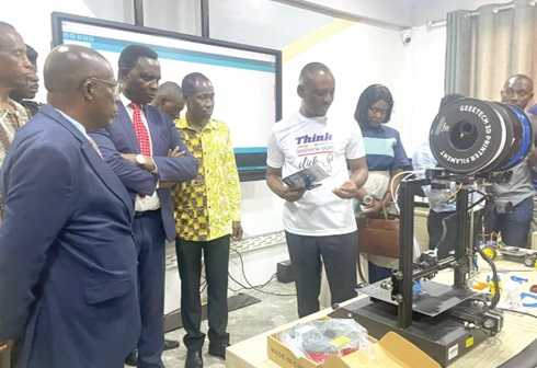 Dr Yaw Osei Adutwum (2nd from left), Minister of Education, and Professor Obeng Mireku (left), President of Wisconsin International University College, observing some equipment in the laboratory Dr Yaw Osei Adutwum (2nd from left), Minister of Education, and Professor Obeng Mireku (left), President of Wisconsin International University College, observing some equipment in the laboratory