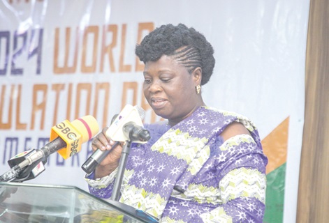 Florence Hagan (right), acting Executive Director, National Population Council, addressing the meeting Florence Hagan (right), acting Executive Director, National Population Council, addressing the meeting