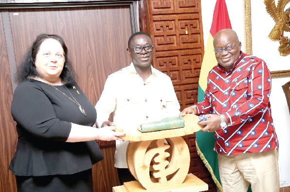 President Akufo-Addo (right) presenting a gift to Schlomit Sufa (left), the outgoing Israeli Ambassador to Ghana, at the Jubilee House. With them is Emmanuel Enos, Director of State Protocol. Picture: SAMUEL TEI ADANO President Akufo-Addo (right) presenting a gift to Schlomit Sufa (left), the outgoing Israeli Ambassador to Ghana, at the Jubilee House. With them is Emmanuel Enos, Director of State Protocol. Picture: SAMUEL TEI ADANO