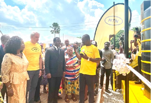 Stephen Blewett (2nd from left), CEO of MTN Ghana, with Rev. John Ntim Fordjour (3rd from left), Deputy Minister of Education, and Joyce Appiah (left), Headmistress of Aburi Presbyterian Senior High Technical School about to comission the water system Stephen Blewett (2nd from left), CEO of MTN Ghana, with Rev. John Ntim Fordjour (3rd from left), Deputy Minister of Education, and Joyce Appiah (left), Headmistress of Aburi Presbyterian Senior High Technical School about to comission the water system