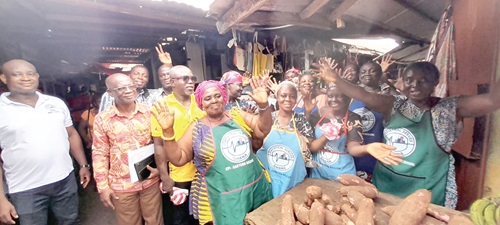 Bright Worlanyo Neku (arrowed), Eastern Regional Director of Ghana Statistical Service, with some traders in the aprons Bright Worlanyo Neku (arrowed), Eastern Regional Director of Ghana Statistical Service, with some traders in the aprons