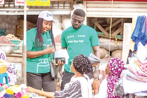 NPA officials educating some women on the Cylinder Recirculation Module and safe use of LPG at the market NPA officials educating some women on the Cylinder Recirculation Module and safe use of LPG at the market