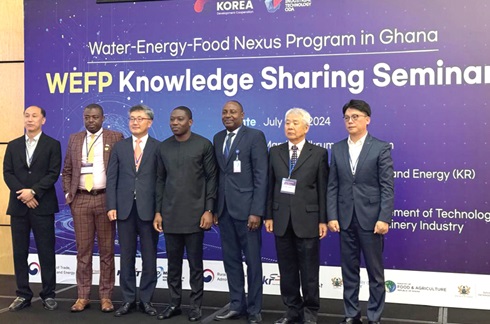Jin Hyo Jeon (right) President, CarryGreen, Korea; Dr Choong-Hoe Kim (2nd from right), Director, KOPIA Ghana Centre; Herbert Krapa (middle), Minister of State, Ministry of Energy; Kap Seok Yoon (3rd from left), Executive Vice-Chairman of KOAMI; Beom Seok Kim (left), Senior Managing Director, Kunwha Engineering and Consulting, and other dignitaries at the knowledge sharing seminar Jin Hyo Jeon (right) President, CarryGreen, Korea; Dr Choong-Hoe Kim (2nd from right), Director, KOPIA Ghana Centre; Herbert Krapa (middle), Minister of State, Ministry of Energy; Kap Seok Yoon (3rd from left), Executive Vice-Chairman of KOAMI; Beom Seok Kim (left), Senior Managing Director, Kunwha Engineering and Consulting, and other dignitaries at the knowledge sharing seminar