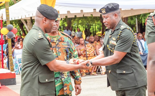 Lt Colonel Edward Sarpong Appiah (left), outgoing Commanding Officer of the 66 Artillery Regiment, presenting the Baton-of-Command to Lt Colonel Jalali Din Ibrahim Lt Colonel Edward Sarpong Appiah (left), outgoing Commanding Officer of the 66 Artillery Regiment, presenting the Baton-of-Command to Lt Colonel Jalali Din Ibrahim