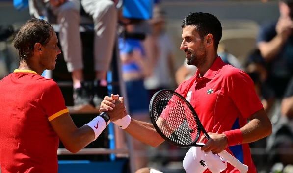 Serbia's Novak Djokovic (right) shakes hands with Spain's Rafael Nadal after the two faced off in the Paris Olympics — their 60th matchup overall. Serbia's Novak Djokovic (right) shakes hands with Spain's Rafael Nadal after the two faced off in the Paris Olympics — their 60th matchup overall.