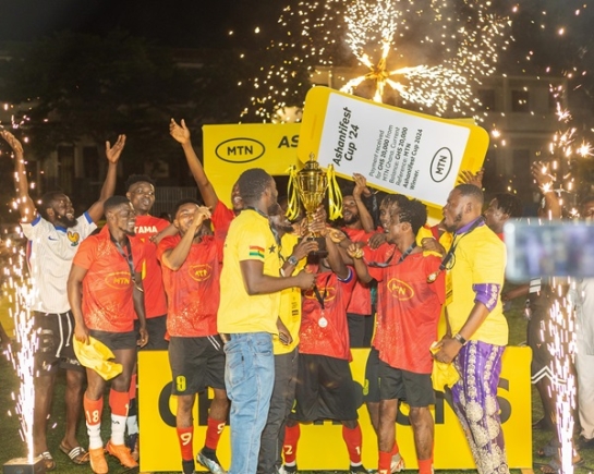 Players of Bantama celebrating with the trophy Players of Bantama celebrating with the trophy