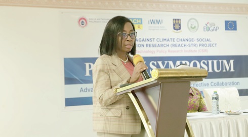 Prof. Marian Dorcas Quain (inset), Deputy Director-General, Council for Scientific and Industrial Research, addressing participants in the symposium Prof. Marian Dorcas Quain (inset), Deputy Director-General, Council for Scientific and Industrial Research, addressing participants in the symposium Prof. Marian Dorcas Quain (inset), Deputy Director-General, Council for Scientific and Industrial Research, addressing participants in the symposium