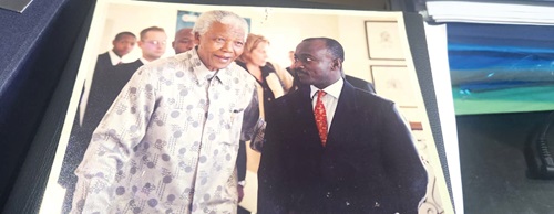 The writer with the late President Nelson Mandela of South Africa