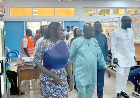 Nana Effah Apenteng (middle) with some board members at the Physiotherapy centre. INSET: The hostel facility under construction Nana Effah Apenteng (middle) with some board members at the Physiotherapy centre. INSET: The hostel facility under construction