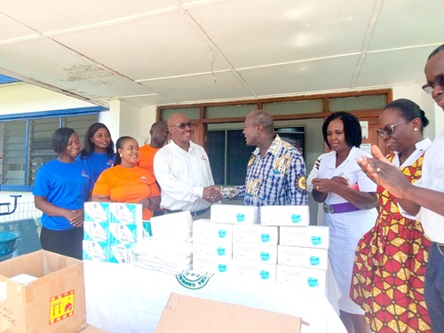 Dr Richard Anthony (4th from right), Medical Director, Tema General Hospital, receiving the items from Dominic Ocloo, Director of Production and Sales, Rikair. With them are staff of both establishments Dr Richard Anthony (4th from right), Medical Director, Tema General Hospital, receiving the items from Dominic Ocloo, Director of Production and Sales, Rikair. With them are staff of both establishments