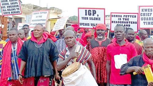 Nenyi Kweku Kormitey (2nd from left), acting National President of the Senya Bereku Traditional Area, leading a protest march against the encroachment on the town's lands Nenyi Kweku Kormitey (2nd from left), acting National President of the Senya Bereku Traditional Area, leading a protest march against the encroachment on the town's lands